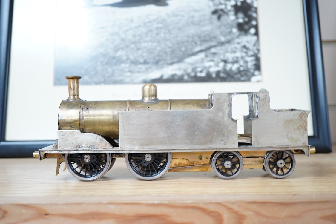Eleven 0 gauge model railway items including; a bogie stake wagon, two mineral wagons, a North British coal wagon and two further open wagons, a partly constructed brake van, together with a Lima LMS 4F locomotive, two L